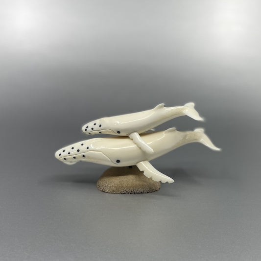 Ivory whale and baby whale figurine